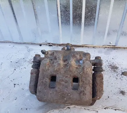 Subaru Forester SF Front brake caliper