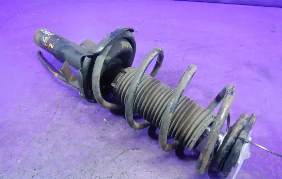 Front shock absorber with coil spring