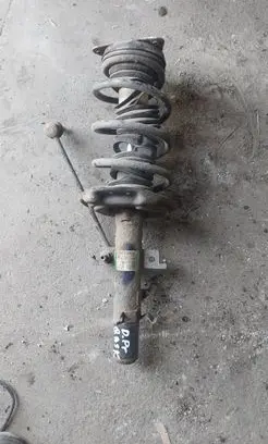 Front shock absorber with coil spring