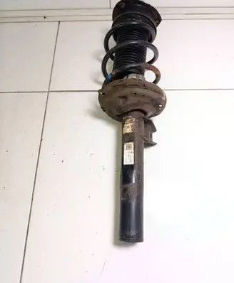 Volkswagen Golf VII Front shock absorber with coil spring 5Q0413023FK 5Q0413023