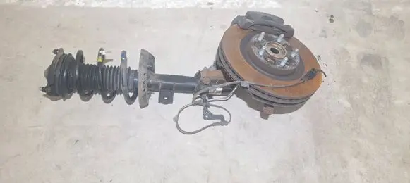 Front wheel hub spindle knuckle