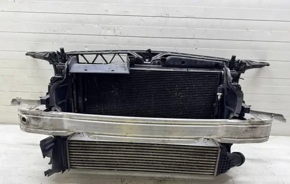 Radiator support slam panel