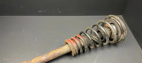 Nissan Primera Front shock absorber/damper 561102F025