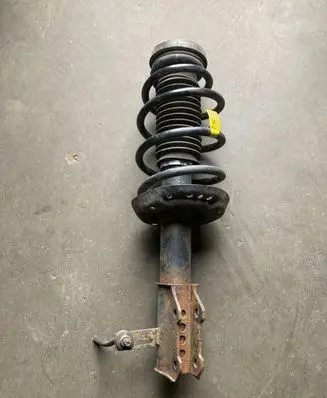 Chevrolet Orlando Front shock absorber with coil spring 13307870 0552