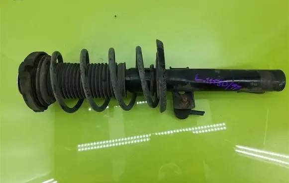 Volkswagen Polo Front shock absorber with coil spring