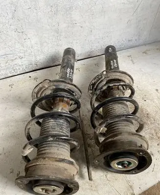 Volkswagen Touran III Front shock absorber with coil spring