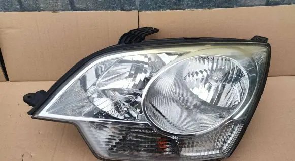 Opel Antara Headlight/headlamp 87TGM 00024574