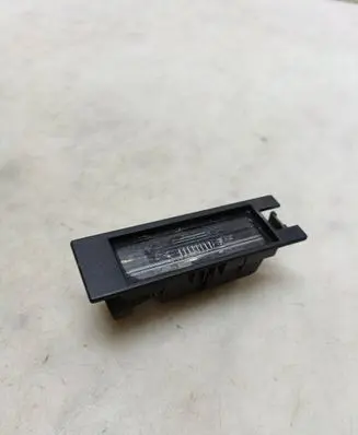 Opel Astra H Number plate light 57581 0461200 13139990