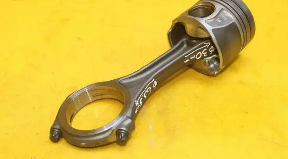 Piston with connecting rod