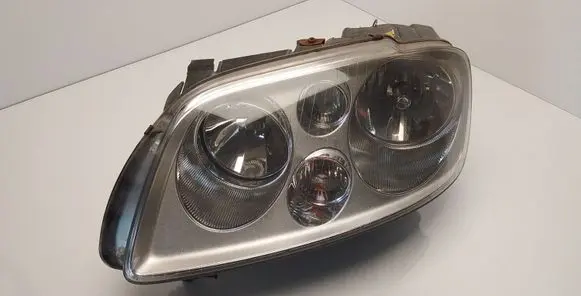 Volkswagen Touran I Headlight/headlamp 1T0941005F