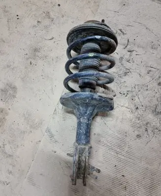 Hyundai Trajet Front shock absorber with coil spring 334237