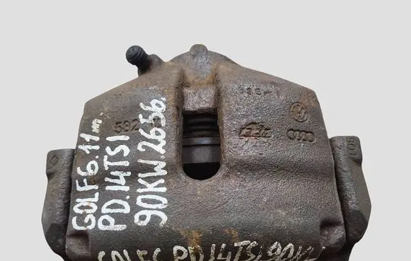 Volkswagen Golf VI Front brake caliper