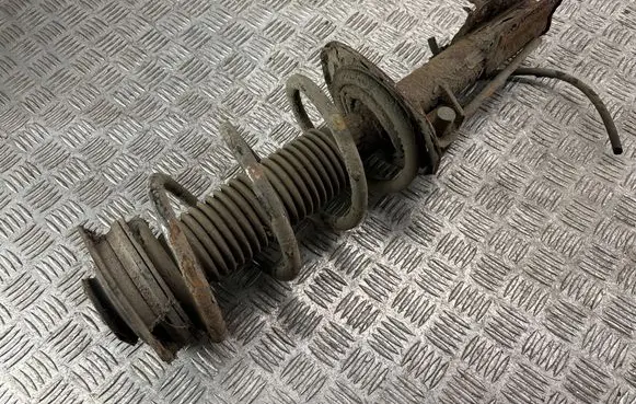 Nissan X-Trail T31 Front shock absorber with coil spring