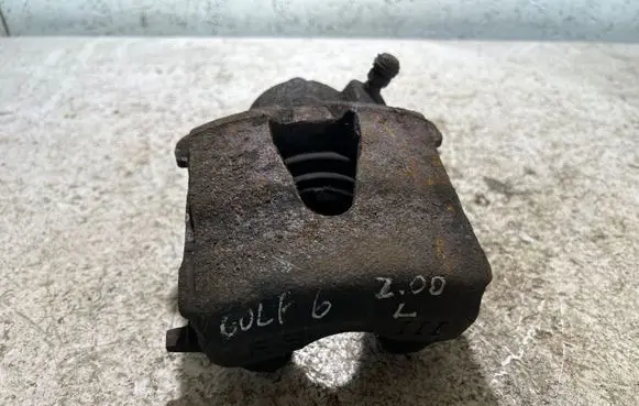Volkswagen Golf VI Front brake caliper