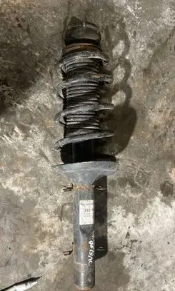 Skoda Octavia Mk1 (1U) Front shock absorber with coil spring 315087 824908 111600