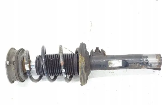 Volkswagen Golf VII Front shock absorber with coil spring 5Q0413031FF