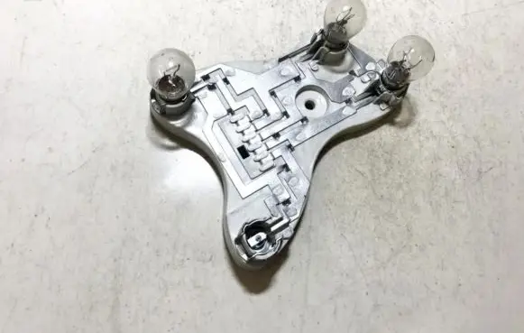Mitsubishi Carisma Tail light bulb cover holder