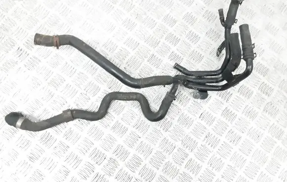 Volkswagen Golf VII Engine coolant pipe/hose 04L121064AF