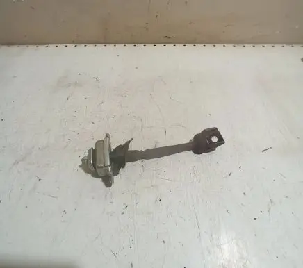 Front door check strap stopper