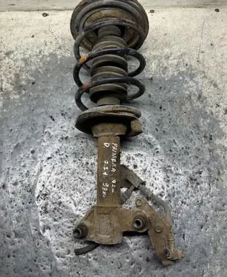 Nissan Primera Front shock absorber with coil spring