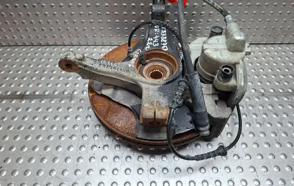 Front wheel hub spindle knuckle