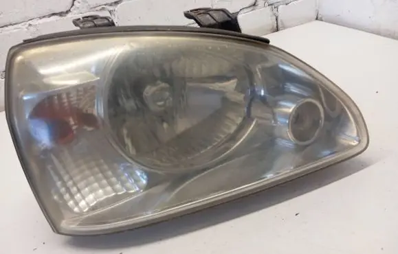 KIA Carens I Headlight/headlamp 83630857 0857