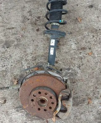 Volkswagen Golf VII Front shock absorber with coil spring 5Q0413023FJ