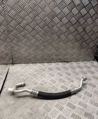 Opel Corsa F Air conditioning (A/C) pipe/hose 9829525880 T706630B