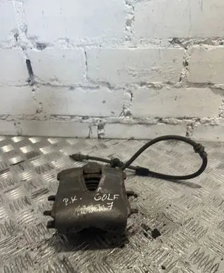 Volkswagen Golf VII Front brake caliper