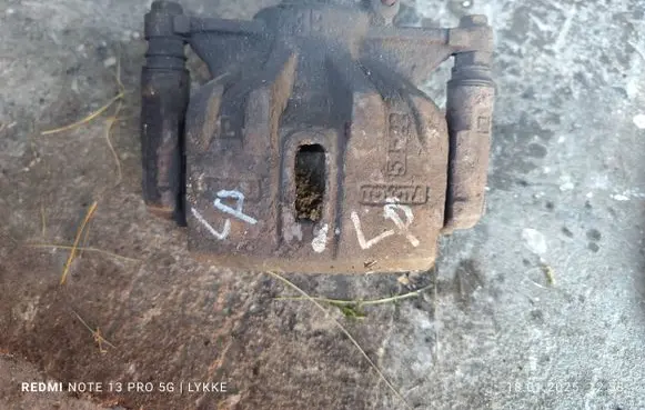 Toyota Corolla E110 Front brake caliper 