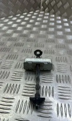 Mazda 6 Rear door check strap stopper