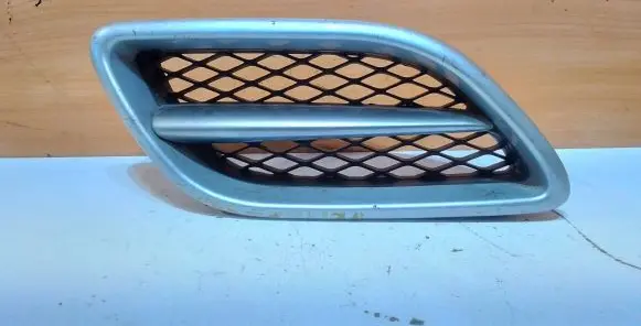Nissan Primera Front bumper lower grill 623209F5