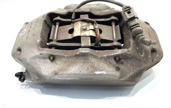 Volkswagen Touareg I Front brake caliper 