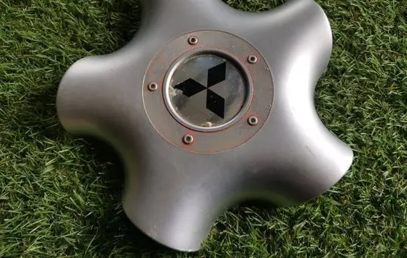 Mitsubishi Carisma Original wheel cap