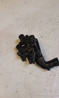 Thermostat/thermostat housing