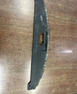 Engine bonnet/hood lock trim molding