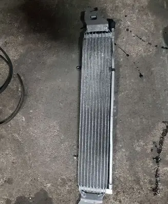 Opel Astra J Transmission/gearbox oil cooler 52432861