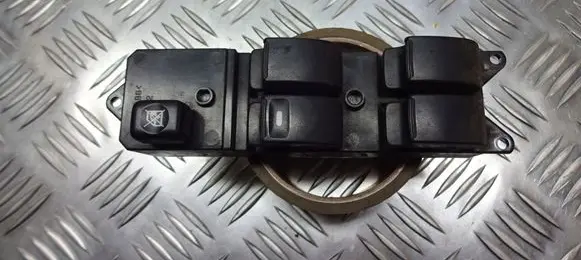 Mitsubishi Lancer Front door window switch trim MR587878