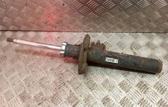 Volkswagen Golf V Front shock absorber/damper 1K0413031AC