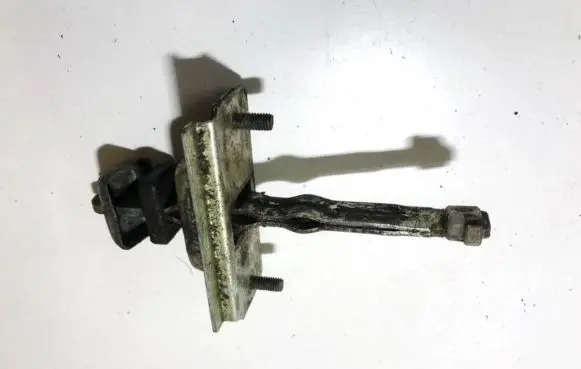 Mazda 626 Front door check strap stopper 