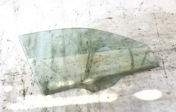 Mazda 626 Front door window glass four-door