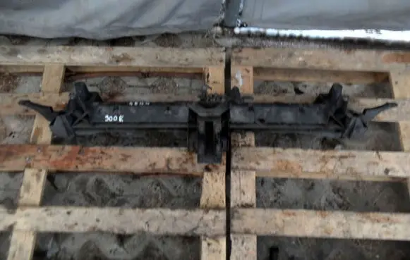 Top upper radiator support slam panel