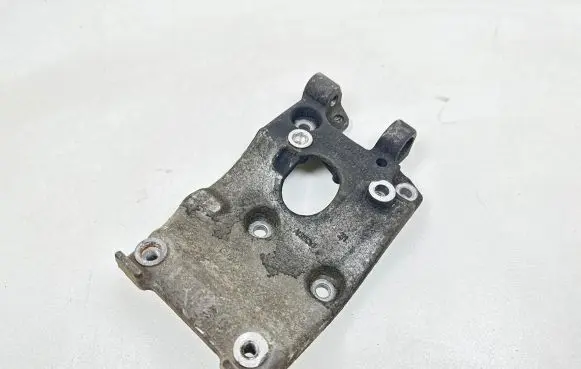 Ford Fiesta A/C compressor mount bracket AV208D611AB