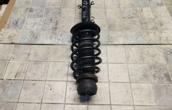 Volkswagen Golf IV Front shock absorber with coil spring 634812