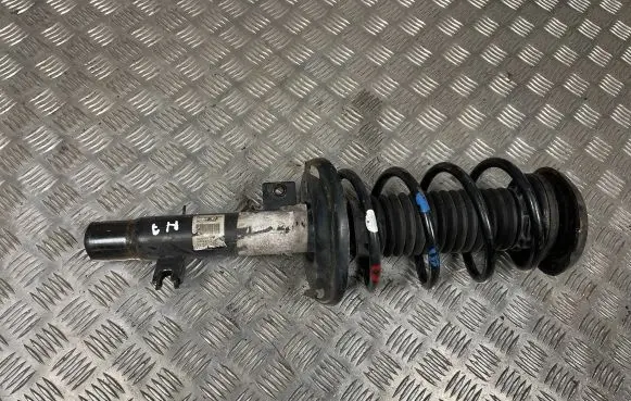 Front shock absorber with coil spring