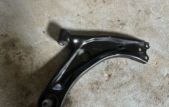 Toyota Yaris XP210 Front lower control arm/wishbone 48605K002C