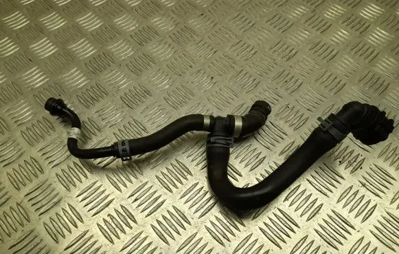 Volkswagen Polo VI Engine coolant pipe/hose 06Q121065C