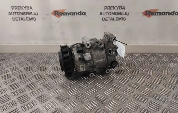 KIA Sportage Air conditioning (A/C) compressor (pump) 97701D7600 R134AORR1234YF
