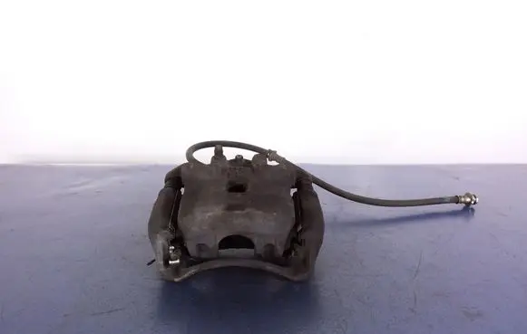 Nissan Juke I F15 Front brake caliper