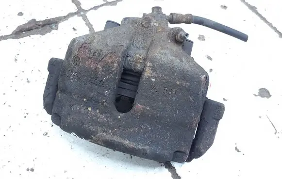 Volkswagen Golf V Front brake caliper